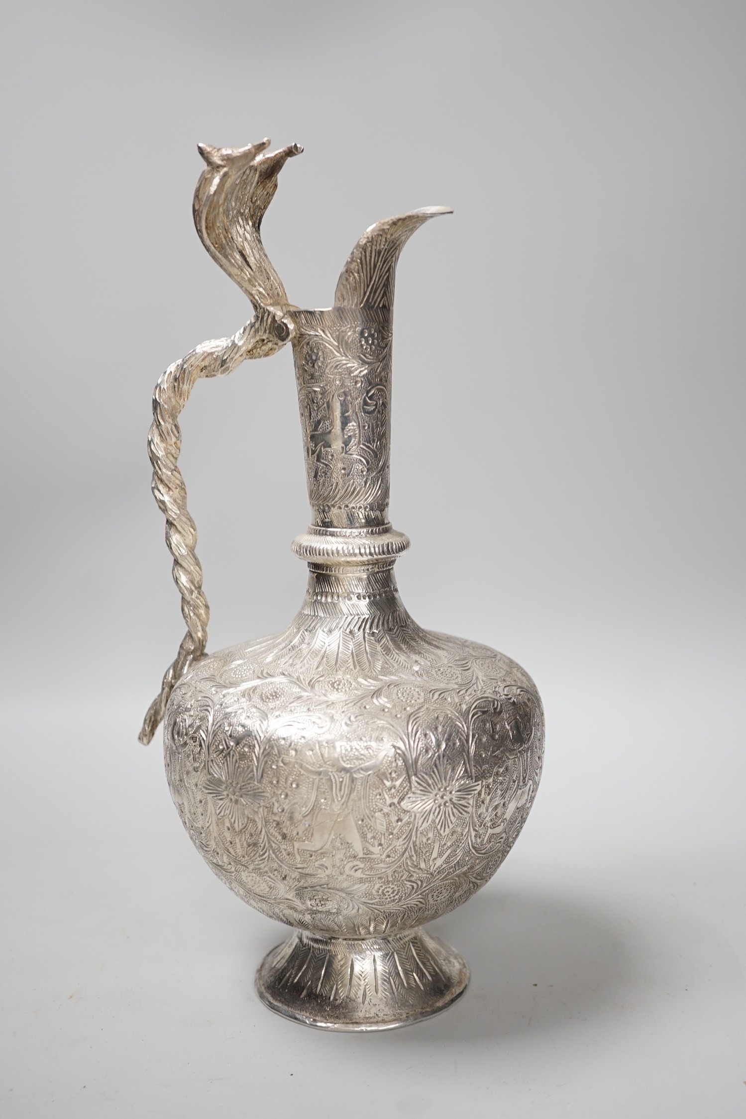 A decorative Indian silver plated cobra ewer. 29.5cm